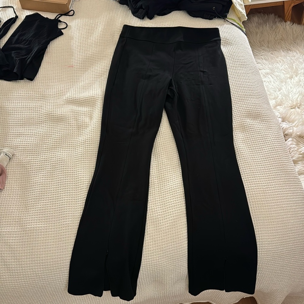 J crew NWT stretch black flares with front ankle zip.